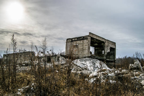 Landscape with old destroyed houses and buildings against