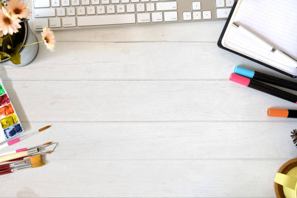 istock Artist designer workspace with creative supplies and copy space 1056564578