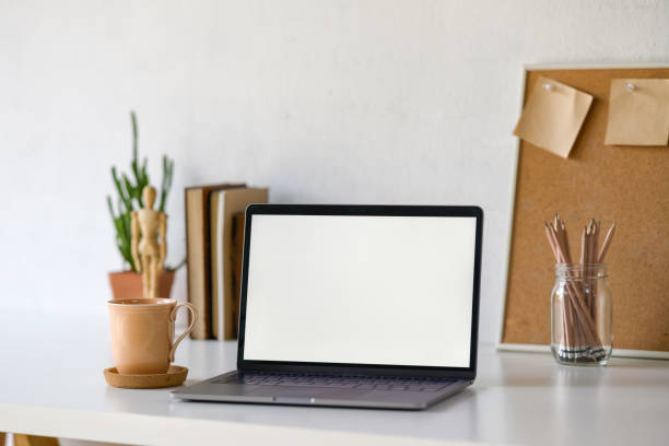istock Workspace of creative designer with blank screen laptop. 1056564698