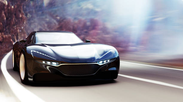 istock black car driving on a mountain road 1056576936