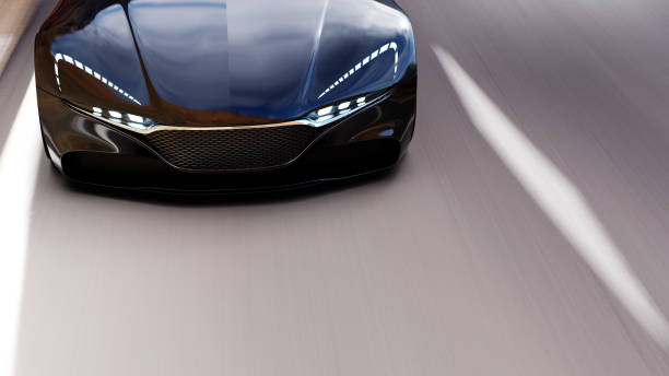 istock black car driving on a mountain road 1056576944