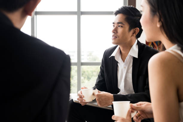 istock Asian Businesspeople are paying attention while meeting at the office. 1056579108