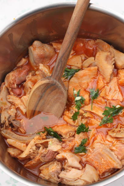 istock Tripe cooked in tomato sauce and spices 1056591128