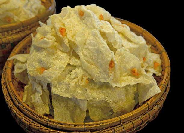 istock Fried Fish Dumplings in the basket, black background 1056592040