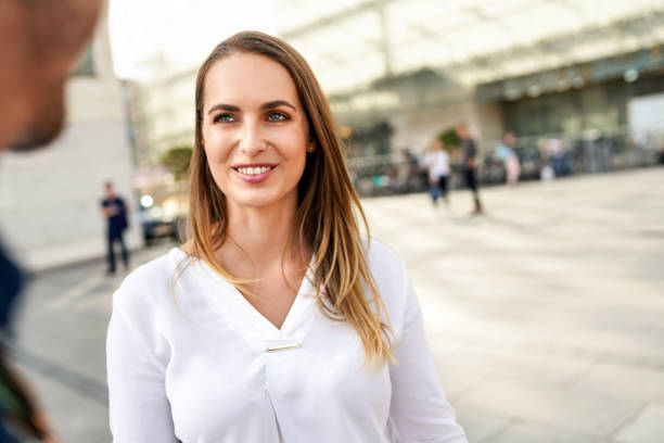 istock Woman looking at man outdoors 1056592126