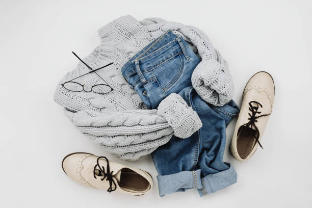 istock Flat lay of various cozy woman's clothes and accessories on white 1056594406