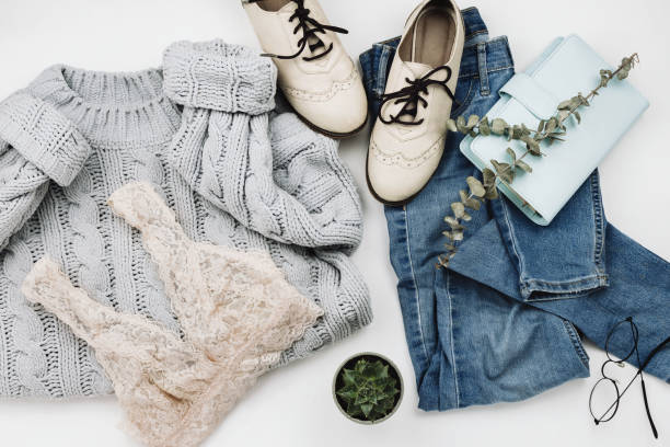 istock Flat lay of various cozy woman's clothes and accessories on white 1056594474
