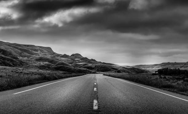 Road to Nowhere Highway through the Badlands of Alberta Canada. angle photos stock pictures, royalty-free photos & images