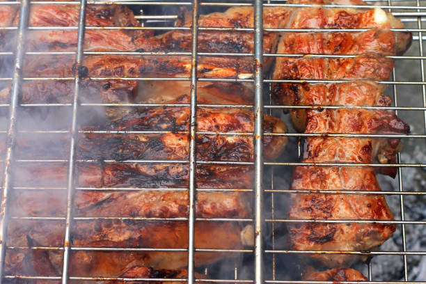 istock Barbeque fried on the bonfire and coals 1056601142