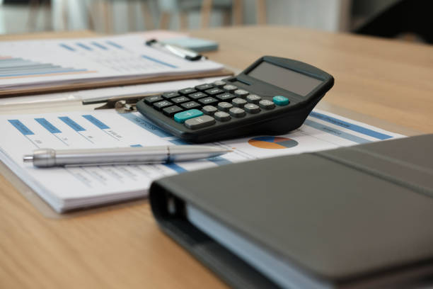 istock calculator, document n desk at office workplace. business workspace 1056601566