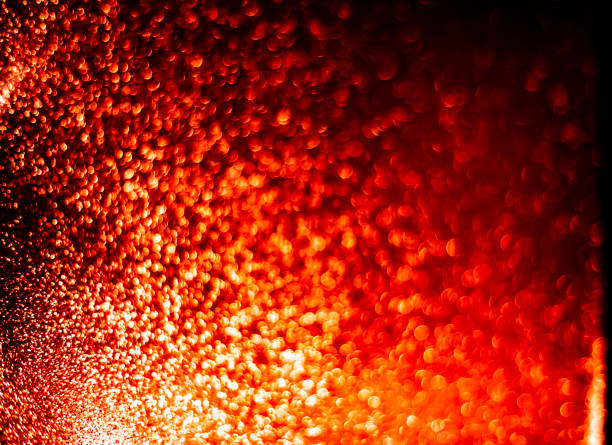 istock Abstract bokeh glitter background. Defocused background. Blurred bright light on black 1056601620
