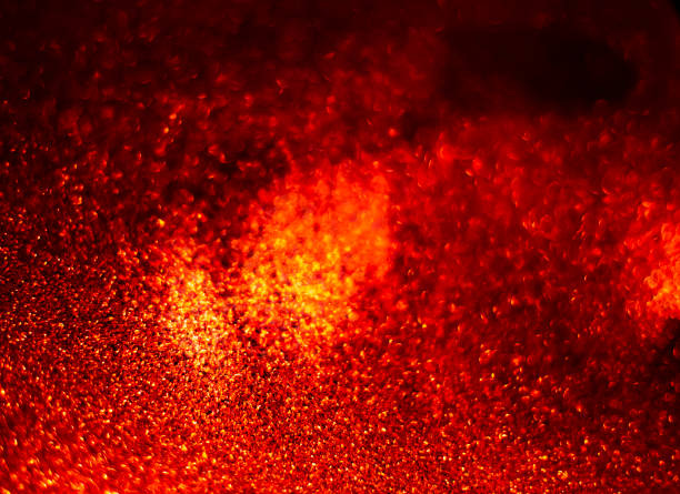 istock Abstract bokeh glitter background. Defocused background. Blurred bright light on black 1056601640
