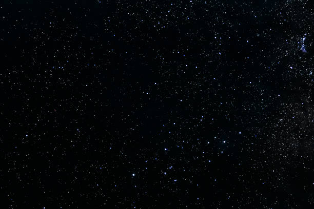 istock Stars and galaxy outer space sky night universe black background 1056607436