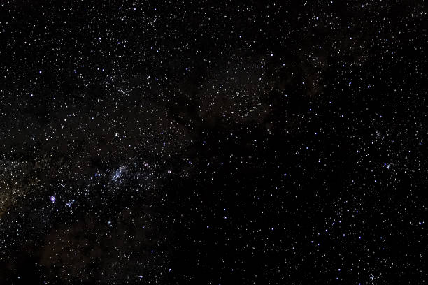 istock Stars and galaxy outer space sky night universe black background 1056607440