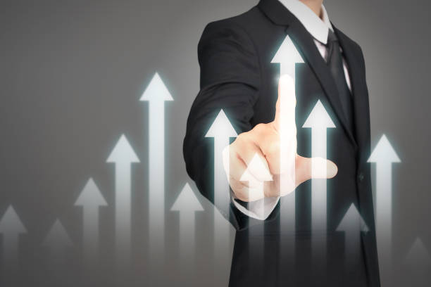 istock Businessman plan graph growth and increase of chart positive indicators 1056607948