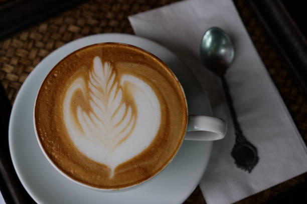 istock close up top view lattee coffe on wooden background and copyspace, drink and beverage concept. 1056608518