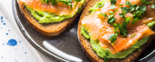 istock Rye bread avocado toasts with smoked salmon 1056613272