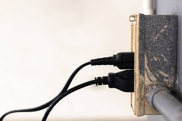 istock electricity plugs in the socket outlet , copy space 1056613532