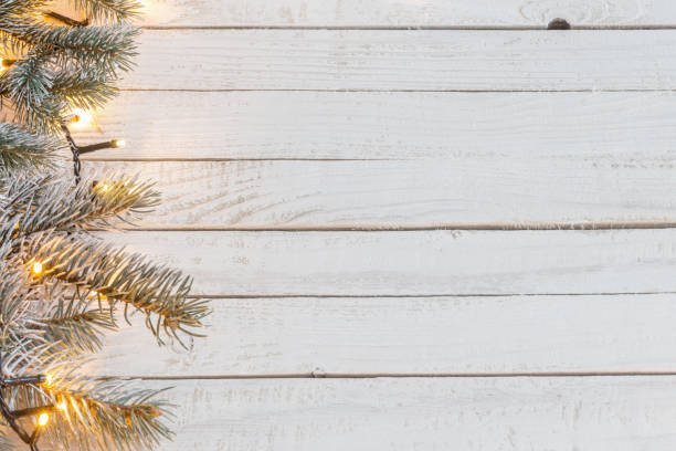 istock Christmas garland on  wooden background 1056619014