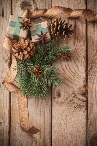 istock Christmas decorations on old wooden background 1056619018