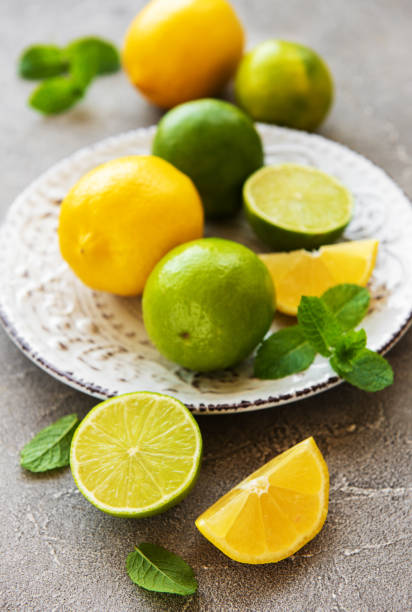istock Plate with lemons and limes 1056622790
