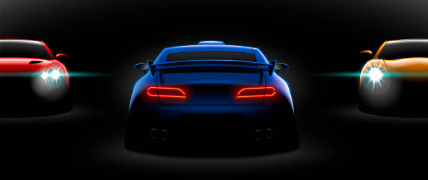 istock realistic red yellow blue three sport car view with unlocked headlights in the dark 1056623036