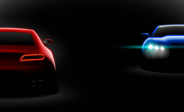 istock realistic red blue two sport car view with unlocked headlights in the dark 1056623044