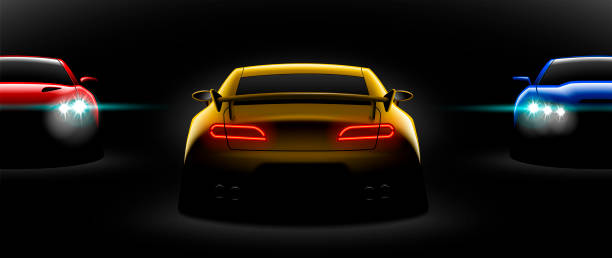istock realistic red yellow blue three sport car view with unlocked headlights in the dark 1056623052