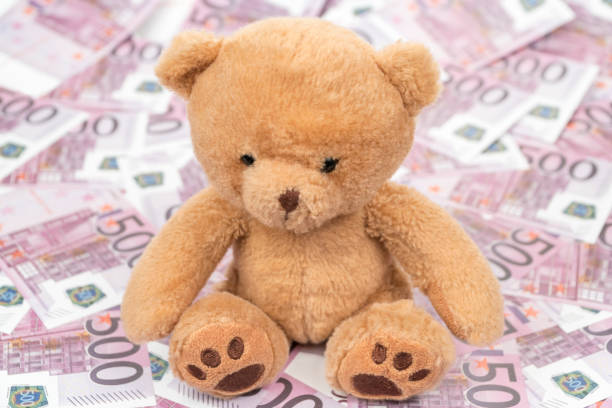 istock teddy bear on euro money 1056628400