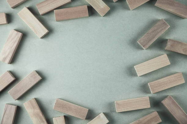 istock Wooden blocks on gray background. 1056628492