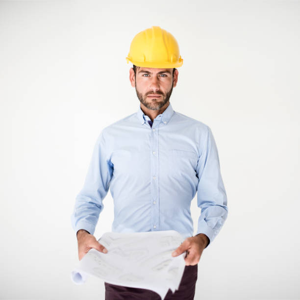 istock Portrait of male architect analyzing blueprint 1056628522