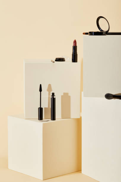 istock various makeup supplies lying on beige cubes 1056628904