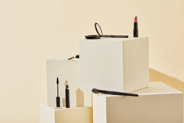 istock various makeup supplies lying on beige cubes 1056628908