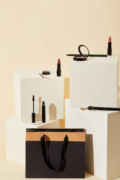 istock various makeup supplies lying on beige cubes with paper bag 1056628918