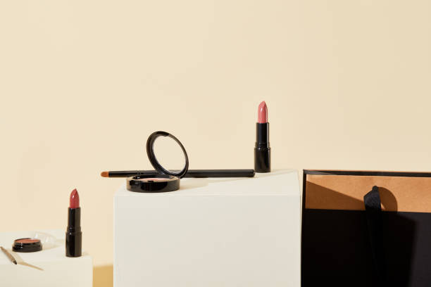 istock various cosmetics lying on beige cubes with paper bag 1056628924