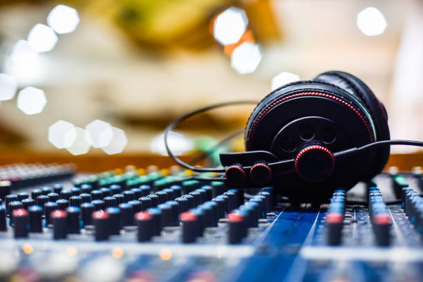 istock DJ headphones and DJ mixer. 1056632038