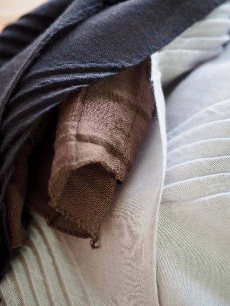 istock Black, brown, beige, gray autumn scarf 1056632784