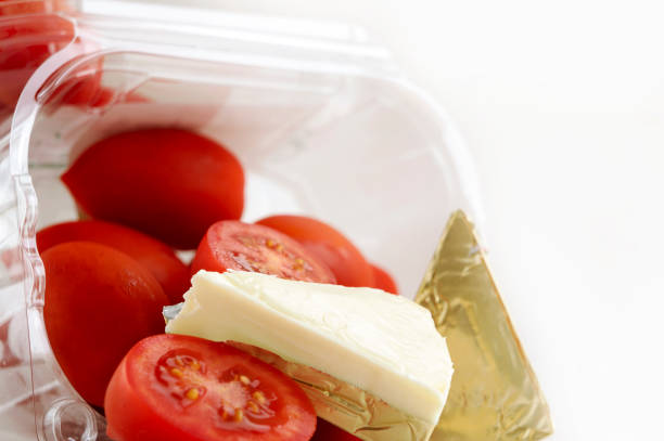 istock Fresh and ripe cherry tomatoes and soft cream cheese 1056636578