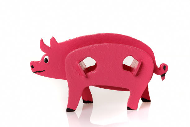 istock Cardboard toy pig, the symbol of the year 1056636708