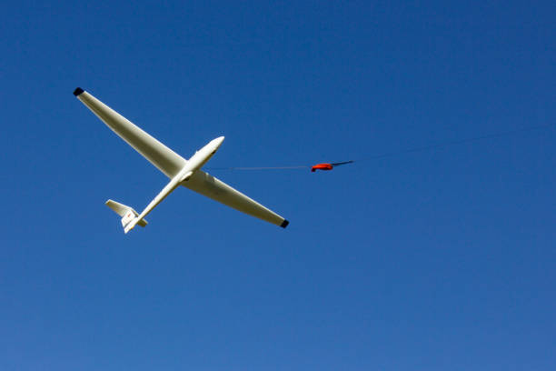 istock glider at winch start on blue sky in south germany 1056641316