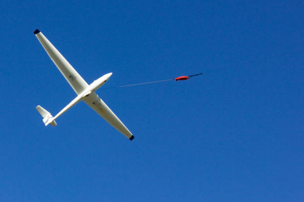 istock glider at winch start on blue sky in south germany 1056641406