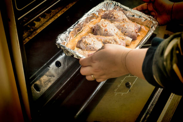 istock Cooking process, chicken legs, oven , close up 1056641964