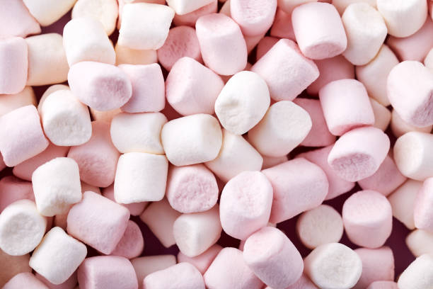 istock Background of white and pink marshmallows 1056650152