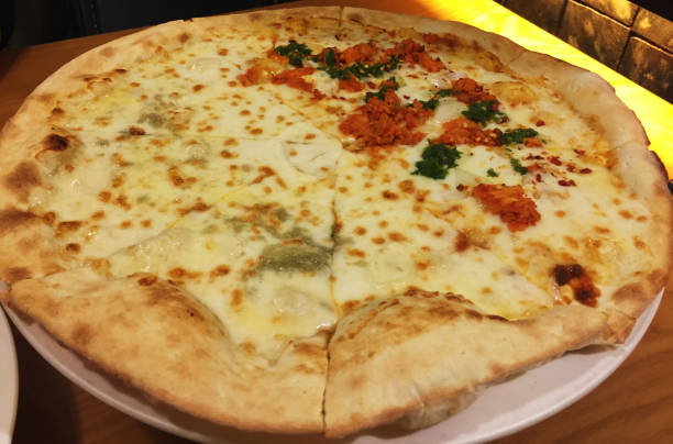 istock Mixed pizza, Gorgonzola and hot bbq 1056659762