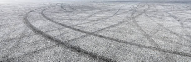 istock Car track asphalt pavement background at the circuit 1056660024