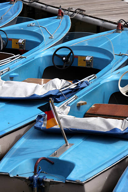 istock Blue pedal boats to a dock 105666274