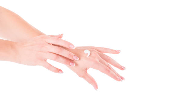 istock Beautiful women hands isolate, applying cream, massaging 1056662954