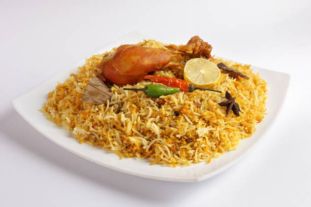 istock Indian traditional chicken biryani in handi dish. 1056663060
