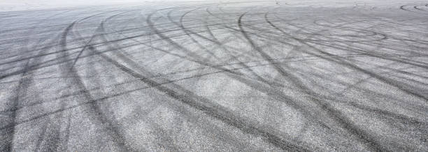 istock Car track asphalt pavement background at the circuit 1056663468