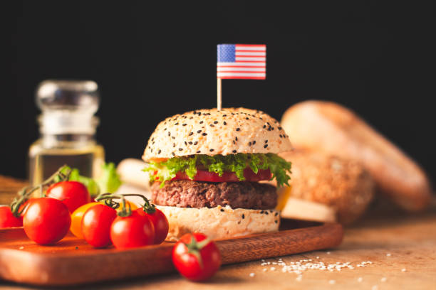 istock Delicious homemade hamburger with fresh vegetables in the kitchen 1056664176